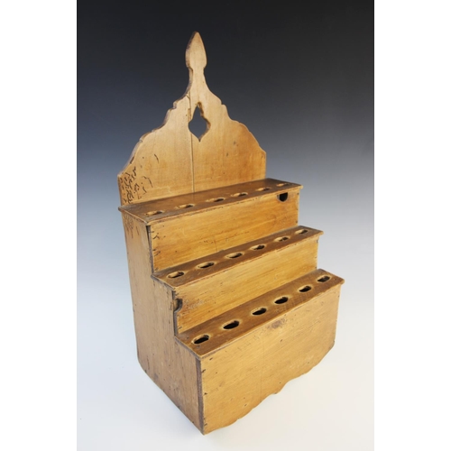 330 - A Welsh pine provincial wall hanging spoon rack, 19th century, of traditional three tier design, wit... 