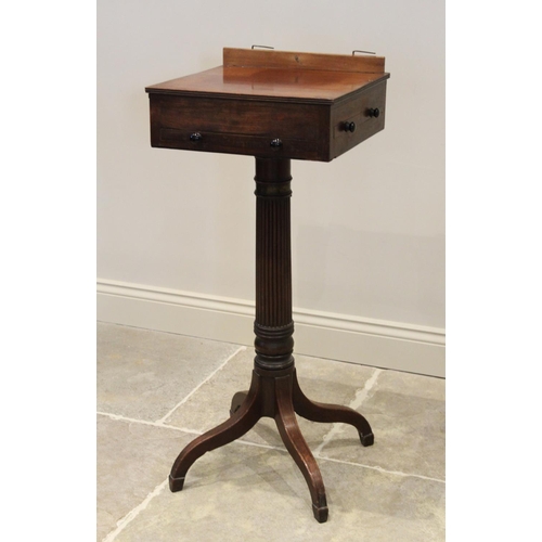 640 - A George III mahogany pedestal quartet music stand, in the manner of Gillows, the rectangular adjust... 