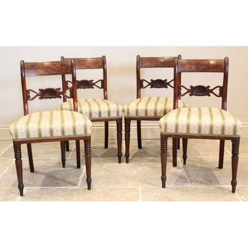 648 - A set of six Regency mahogany dining chairs, each with an openwork crest rail centred with a shell, ... 