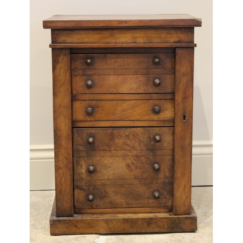 688 - A Victorian figured walnut apprentice Wellington chest, with an arrangement of three drawers, the up... 