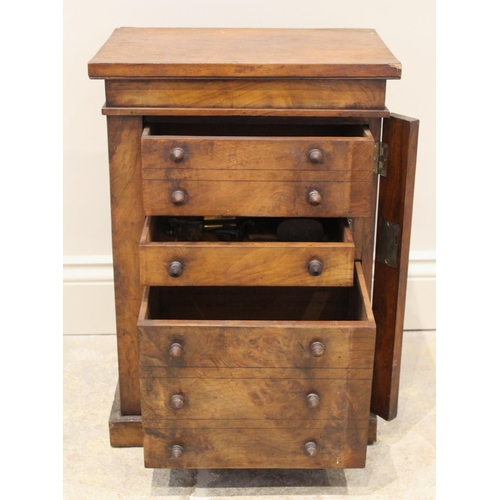 688 - A Victorian figured walnut apprentice Wellington chest, with an arrangement of three drawers, the up... 