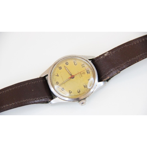 78 - A Gentleman's vintage Tudor Oyster 'Shock Resisting' wristwatch, the round gold-toned dial with Arab... 