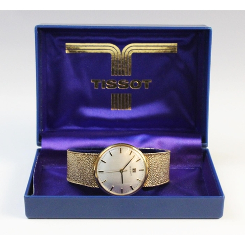 84 - A Gentleman's vintage 9ct gold Tissot wristwatch, the circular silver dial with baton markers, set t... 