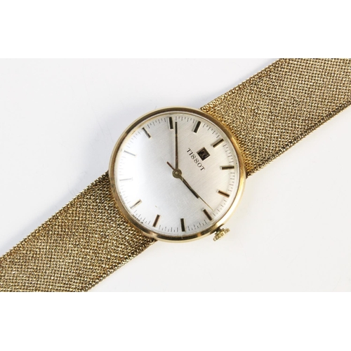 84 - A Gentleman's vintage 9ct gold Tissot wristwatch, the circular silver dial with baton markers, set t... 