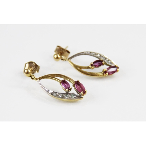 105 - A pair of vintage diamond and ruby set 9ct gold earrings, each comprising two marquise shaped rubies... 