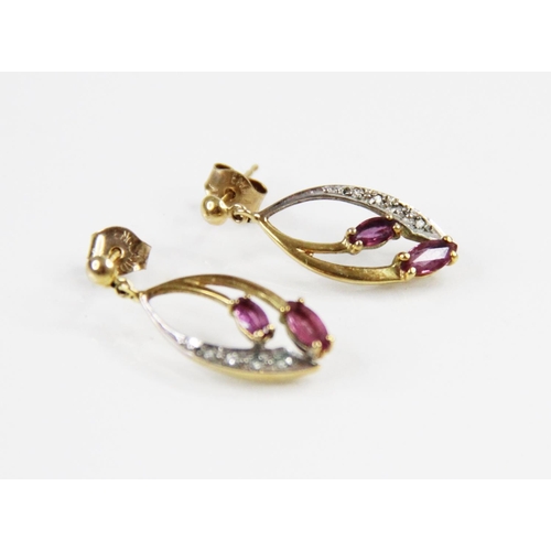 105 - A pair of vintage diamond and ruby set 9ct gold earrings, each comprising two marquise shaped rubies... 