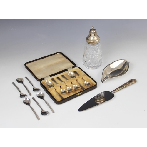 60A - A selection of silver and white metal tableware, to include a silver navette shaped butter dish by F... 