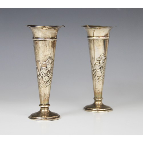 66A - A pair of Art Nouveau silver posy vases by William Comyns, London 1907, each of tapering form with f... 