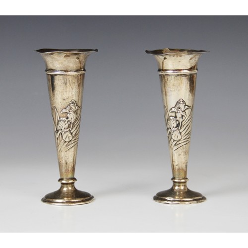 66A - A pair of Art Nouveau silver posy vases by William Comyns, London 1907, each of tapering form with f... 