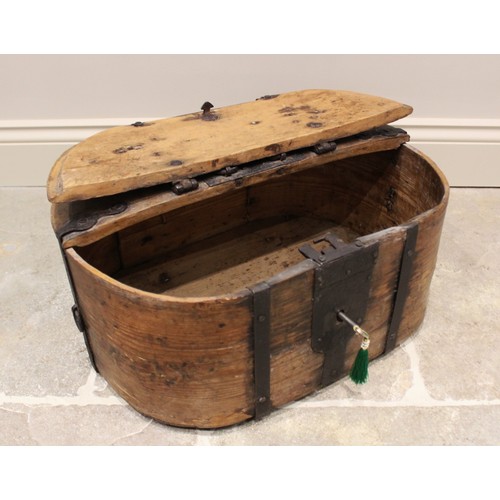 327 - An elm and pine ship's box, 18th century, of oval form with hinged lid and lock, wrought iron bound ... 