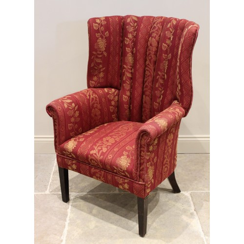 712 - An early 20th century barrel back tub chair, upholstered in claret, the scalloped padded back extend... 