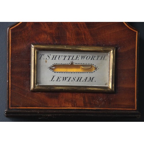 583 - An early 19th century mahogany wheel barometer, T.Shuttleworth, Lewisham, engraved silvered dial wit... 