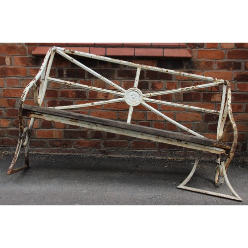 428 - An early 19th century painted iron garden bench, the rail back centred with a cast Lancashire rose r... 