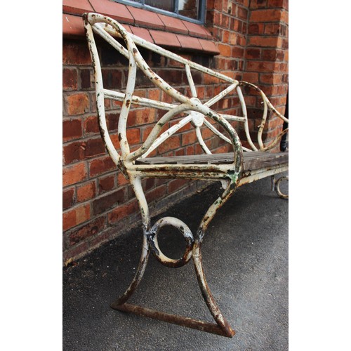 428 - An early 19th century painted iron garden bench, the rail back centred with a cast Lancashire rose r... 