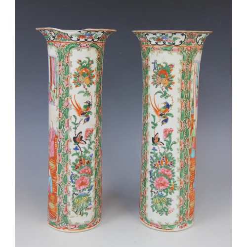 280 - A pair of Chinese Canton vases, 19th century, each of cylindrical sleeve form and decorated in famil... 