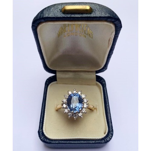 167 - A sapphire and diamond cluster ring, the central oval mixed cut sapphire (measuring approximately 9.... 