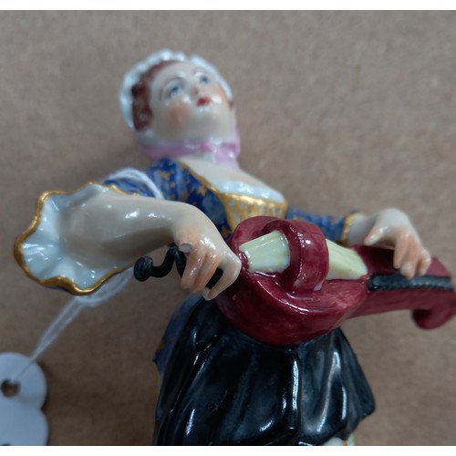 239 - A pair of 18th century Derby musician figures, one modelled as a flautist, the other as a hurdy gurd... 