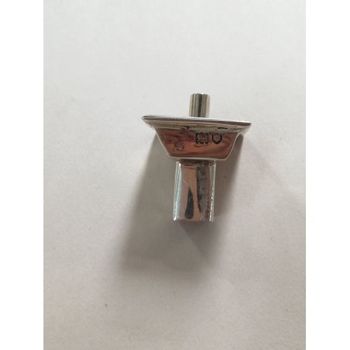 62 - A George V silver table lighter by Charles Boyton & Son Ltd, London 1912, of faceted form on tapered... 