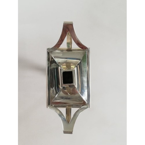 62 - A George V silver table lighter by Charles Boyton & Son Ltd, London 1912, of faceted form on tapered... 