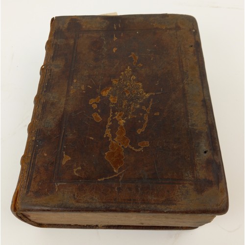 476 - A 16th century 'breeches' Bible, full leather, inscribed 'Gredington... 1592' to front inside cover ... 