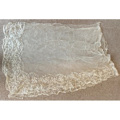 405 - A collection of 19th century and later white and blonde lace shawls, with floral and foliate decorat... 