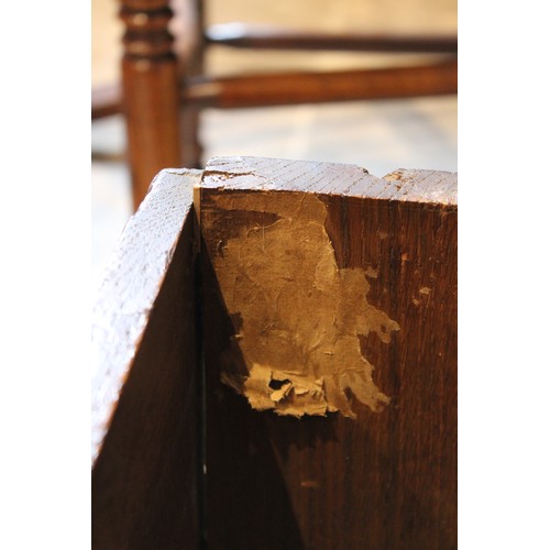 608 - An early eighteenth century oak six plank coffer, the rectangular moulded top opening to an integrat... 