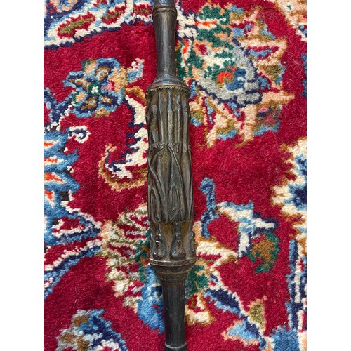 300 - A Naga Tribe spear, 19th century, with barbed iron terminal and carved figural shaft with dyed feath... 