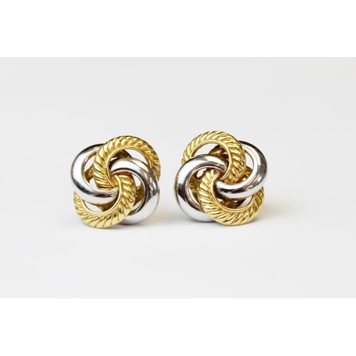 103 - A pair of 18ct gold twist-design earrings, designed as four interlocking hoops in plain polished whi... 