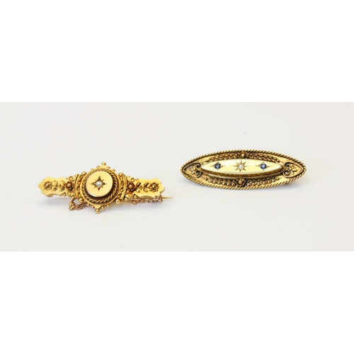 122 - A Victorian 15ct gold diamond set Etruscan bar brooch, Chester 1895, the central round old cut diamo... 