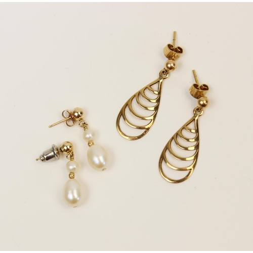 124 - A pair of 9ct gold cultured pearl set drop earrings, each designed as a yellow gold stud suspending ... 