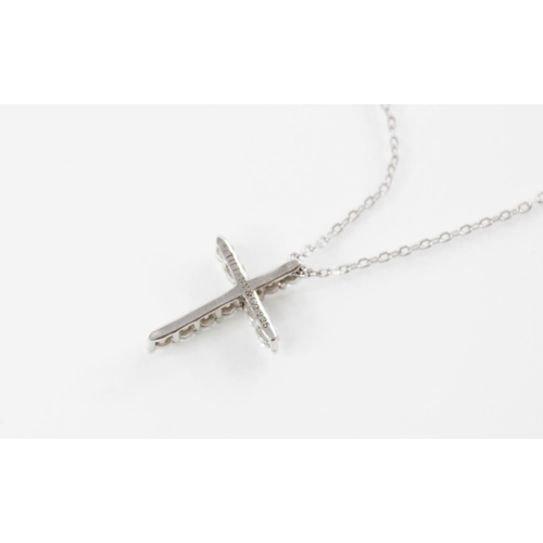 144 - A Tiffany & Co silver cubic zirconia set cross pendant, 20mm x 15mm, set to a silver Tiffany & Co cu... 