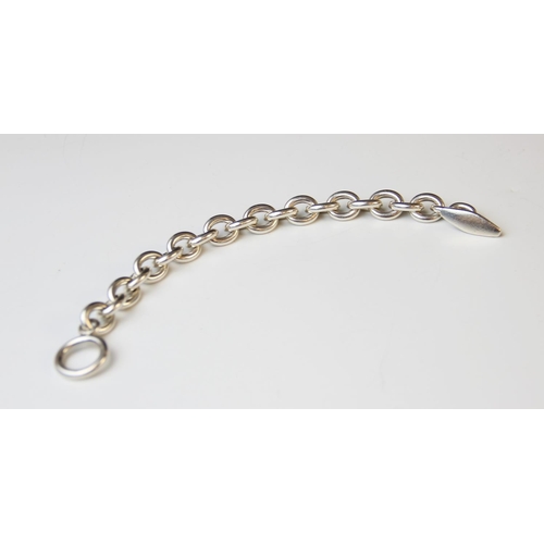 145 - A Georg Jensen heavy cable link silver bracelet, uniform links with T-bar and loop fastening, number... 