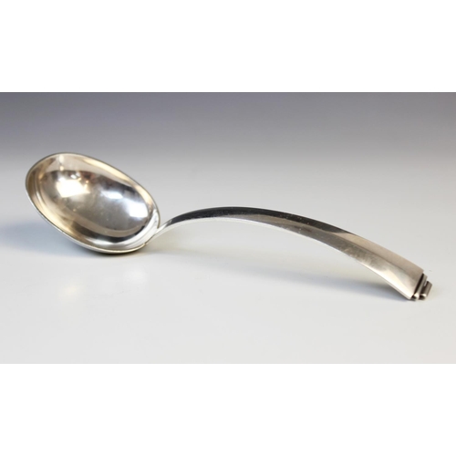 16 - A mid-century Danish 830S silver soup spoon, the oval bowl with tapered handle and stepped terminal,... 
