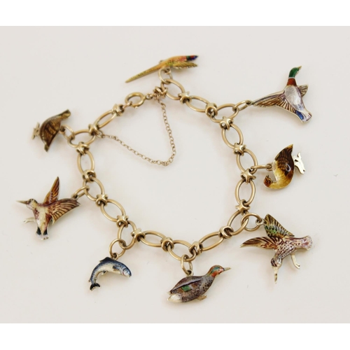 170 - A 9ct gold enamelled charm bracelet by Cropp & Farr, Birmingham 1953, the oval link chain with sprin... 