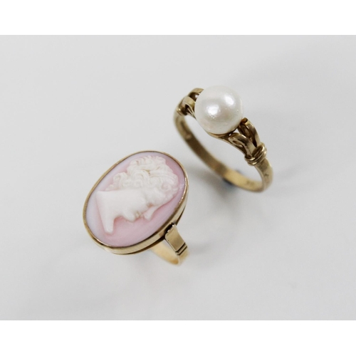 200 - A cameo dress ring, the queen conch carved cameo depicting the silhouette of a woman, measuring 16mm... 