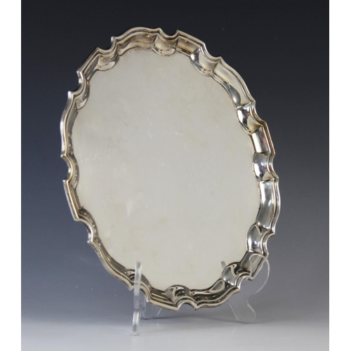 24 - A George VI silver salver by Deakin & Francis, Birmingham 1941, of plain polished circular form with... 