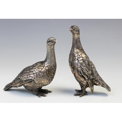 28 - A pair of Patrick Mavros silver grouse, each modelled in a standing position with feather effect cha... 