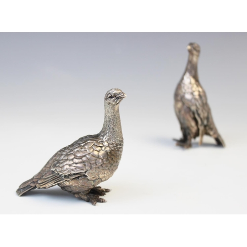 28 - A pair of Patrick Mavros silver grouse, each modelled in a standing position with feather effect cha... 