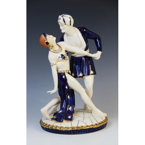 507 - A Royal Dux Art Deco figural group of two dancers, possibly modelled as Rudolph Valentio and Vilma B... 