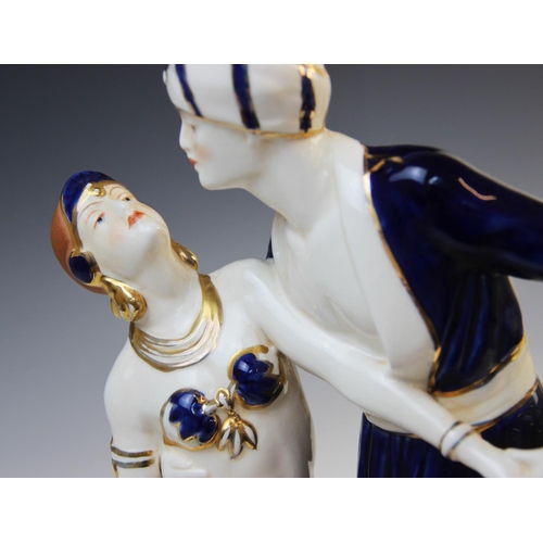 507 - A Royal Dux Art Deco figural group of two dancers, possibly modelled as Rudolph Valentio and Vilma B... 