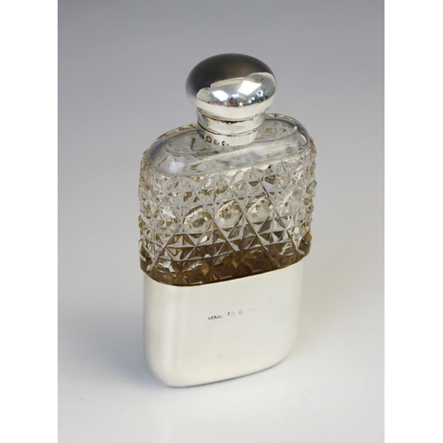 58 - A Victorian cut glass silver mounted hip flask by George Edwin Walton, Birmingham 1896, of rounded r... 