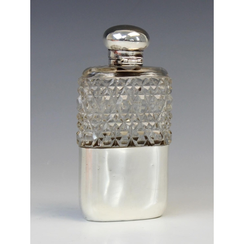 58 - A Victorian cut glass silver mounted hip flask by George Edwin Walton, Birmingham 1896, of rounded r... 