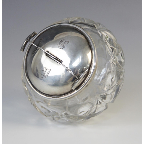 6 - A George V cut glass sugar bowl and silver cover, marks for W. Coulthard Ltd, Birmingham 1931, the c... 