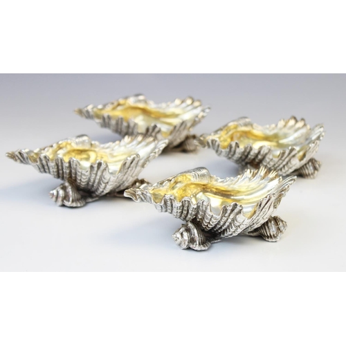 71 - A set of four silver plated shell salts by Elkington & Co, each realistically modelled as a shell wi... 