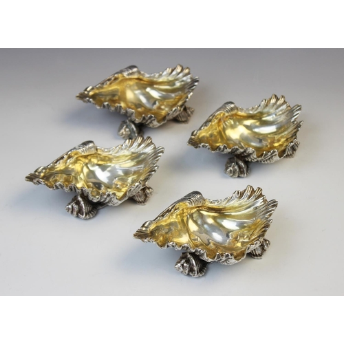 71 - A set of four silver plated shell salts by Elkington & Co, each realistically modelled as a shell wi... 