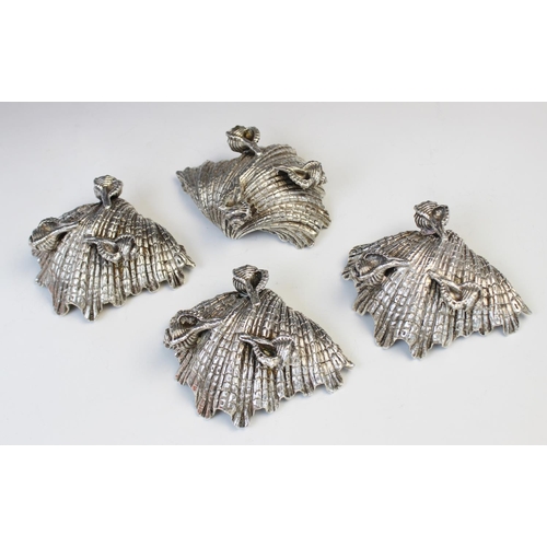 71 - A set of four silver plated shell salts by Elkington & Co, each realistically modelled as a shell wi... 