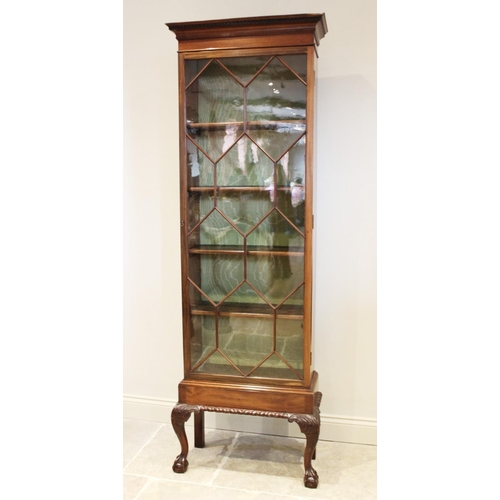 868 - An early 20th century Chippendale revival mahogany display cabinet, with a Greek key pattern frieze ... 