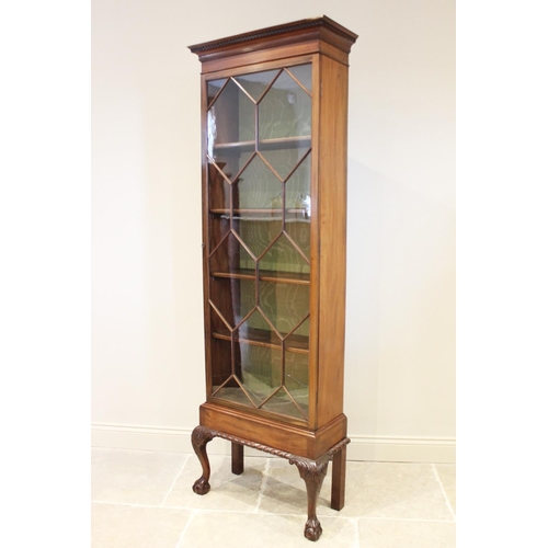 868 - An early 20th century Chippendale revival mahogany display cabinet, with a Greek key pattern frieze ... 