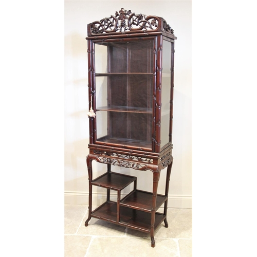 873 - A Hongmu faux bamboo display cabinet on stand, 19th century, the open work intertwined three quarter... 