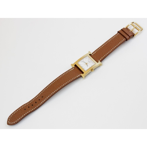 89 - A lady's Hermes Heure H gold plated stainless steel wristwatch, square white dial with Arabic numera... 